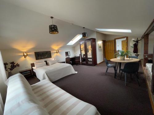 Posezení v ubytování Hotel Vilhelmine