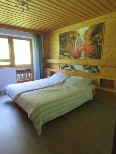 Postel nebo postele na pokoji v ubytování Alpenhaus Denver