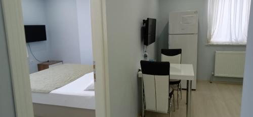 Televisyen dan/atau pusat hiburan di Hannapart Otel