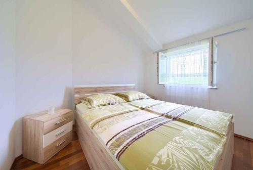 Postel nebo postele na pokoji v ubytování Apartment in Soline - Insel Krk 38395