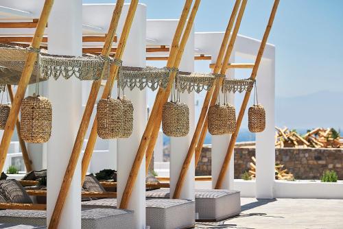 a group of nets hanging from the ceiling of a building at Palladium Hotel in Platis Yialos Mykonos