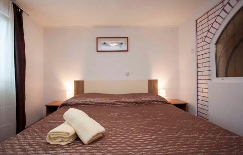 Posteľ alebo postele v izbe v ubytovaní Apartment in Rovinj - Istrien 11608