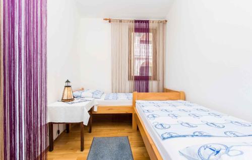 Postel nebo postele na pokoji v ubytování Apartment in Silo - Insel Krk 13498