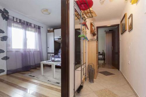 a room with a kitchen with a table and a window at Studio in Crikvenica 5257 in Dramalj