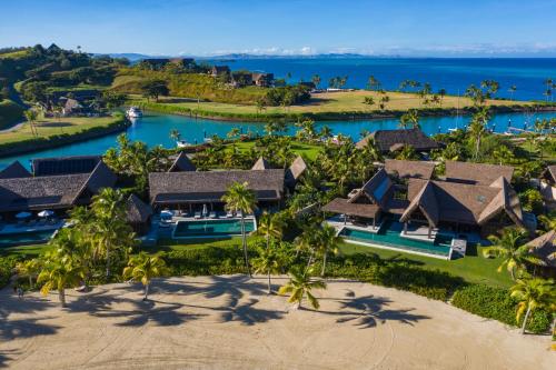 an aerial view of the villas at the resort at Six Senses Fiji in Malolo