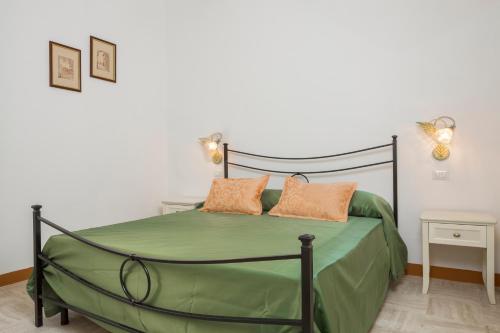 Letto o letti in una camera di B&B I Tetti di Siena