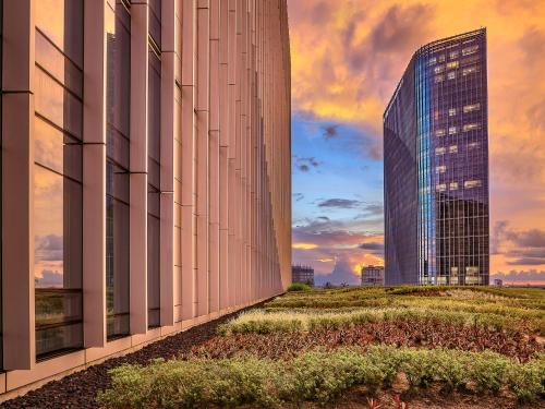 a rendering of a building with two tall buildings at LOTTE Hotel Serviced Apartment in Yangon