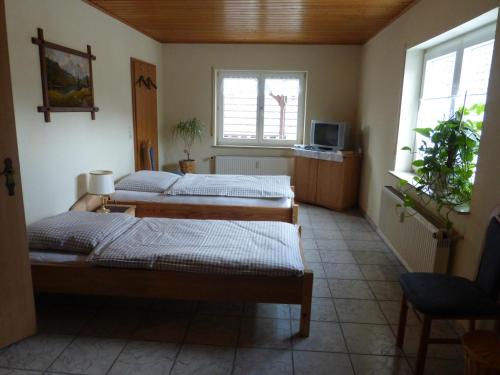 Postel nebo postele na pokoji v ubytování Ferienwohnung Wendt