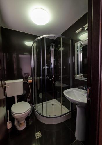 Ванная комната в Escala Rooms