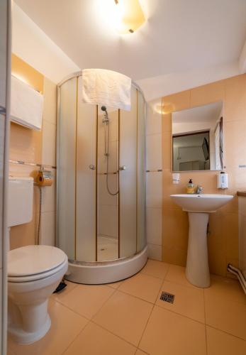 Ванная комната в Escala Rooms