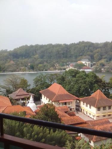 a view from the roof of a building with a river at Heaven Seven Kandy in Kandy