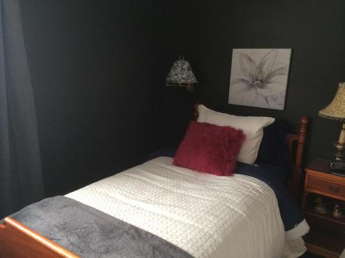 Postel nebo postele na pokoji v ubytování B&B Aux Deux Pignons