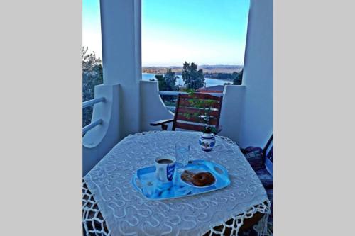 Балкон или терраса в Amazing Sea View-Neos Pyrgos Beach -Evoia Greece