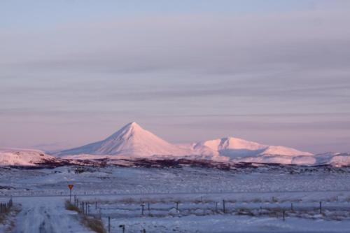 a snow covered mountain in the middle of a desert at Cabin 3 at Lundar Farm in Varmaland