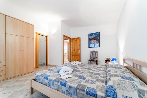Ένα ή περισσότερα κρεβάτια σε δωμάτιο στο Villa Su Sole