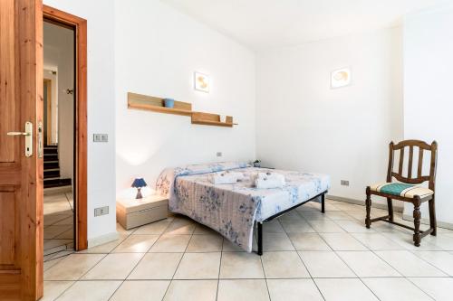 Ένα ή περισσότερα κρεβάτια σε δωμάτιο στο Villa Su Sole