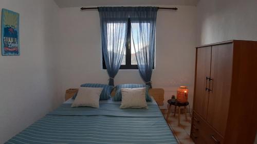 Postel nebo postele na pokoji v ubytování Apartments Beach House