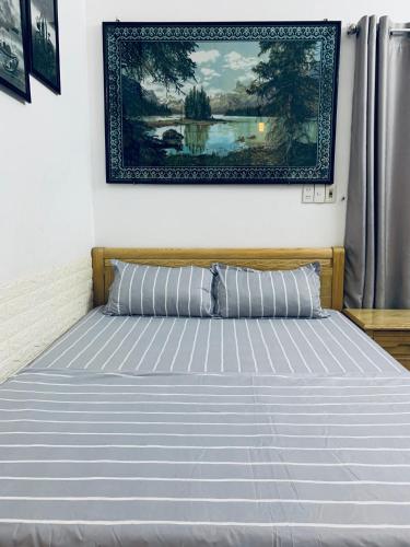 Postel nebo postele na pokoji v ubytování Friendly House Homestay