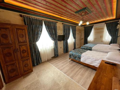 Кровать или кровати в номере Yusuf Bey House