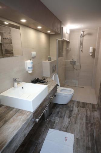 Salle de bains dans l'établissement PALACE MEGDAN