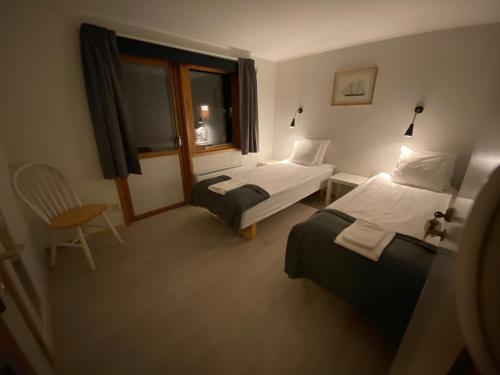 Una cama o camas en una habitación de Alvaret Hotel & Hostel