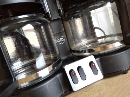 a close up of a toaster oven on a counter at Laholms Vandrarhem in Laholm