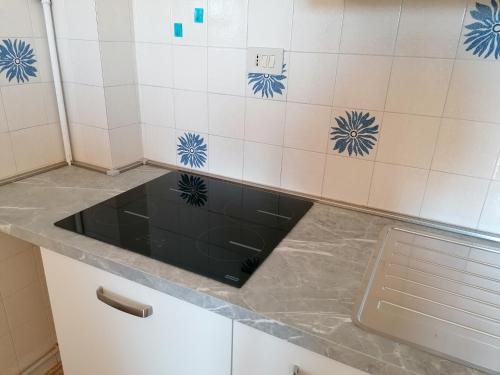a bathroom counter with a sink in the middle at Aurora Residence in Lido Adriano