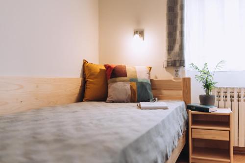 Una cama o camas en una habitación de Apartman Ady 6