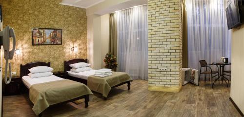 Katil atau katil-katil dalam bilik di Misteriya Hotel