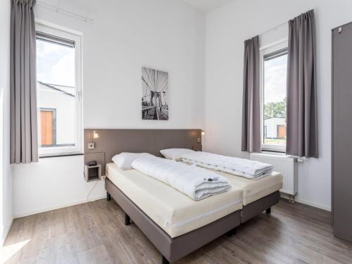 Cama ou camas em um quarto em Modern villa with a themed kids bedroom in Limburg