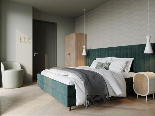 Ένα ή περισσότερα κρεβάτια σε δωμάτιο στο Wellness Villa, Texel