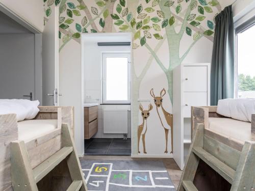 Bathroom sa Modern, child-friendly villa with a fireplace in Limburg