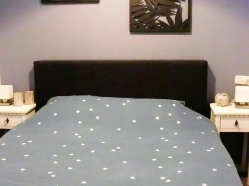 Ένα ή περισσότερα κρεβάτια σε δωμάτιο στο Apartment in Noordwijk near North Sea Beach