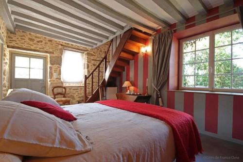 Un pat sau paturi într-o cameră la Le Verger (Le Plessis)