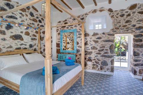 Postel nebo postele na pokoji v ubytování La Caldereta Rural Home