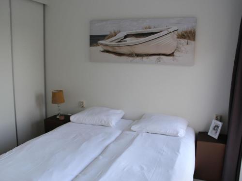 En eller flere senge i et værelse på Resort Mooi Bemelen 8