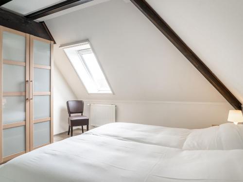 Farmhouse in De Cocksdorp near Beachにあるベッド
