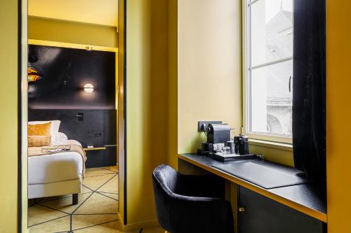 Ein Bett oder Betten in einem Zimmer der Unterkunft Leprince Hotel Spa; Best Western Premier Collection