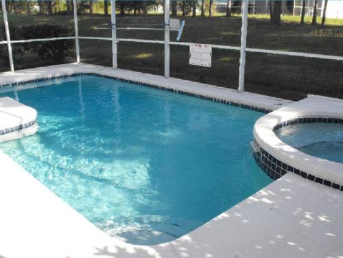 Charming 4 Bedroom 2 Bath Pool Home in Highlands Reserve, Davenport, Statele Unite ale Americii