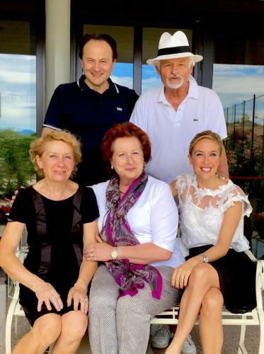 a group of three people posing for a picture at Hotel Alfieri in Sirmione