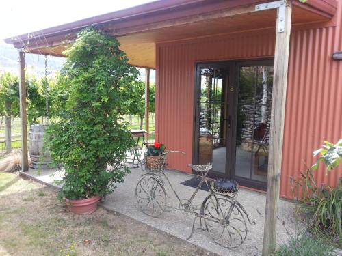 a couple of bikes parked next to a house at River Rock Estate in Cromwell