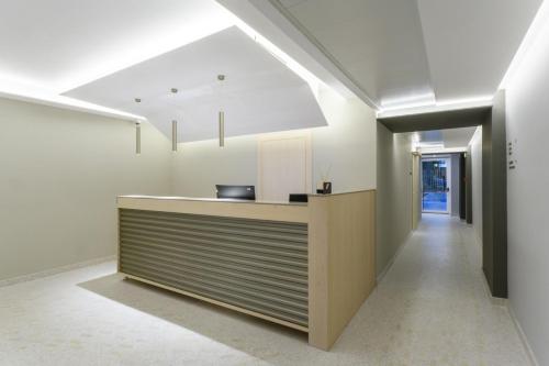 a kitchen with a counter and a hallway at Hangar Hotel in Teverola