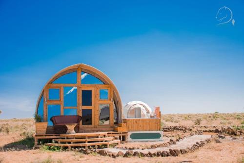 a gazebo in the middle of the desert at Little Amanya Camp in Amboseli