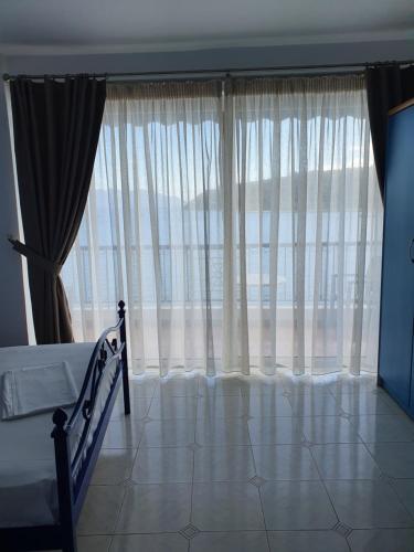 Postel nebo postele na pokoji v ubytování Hotel Mike