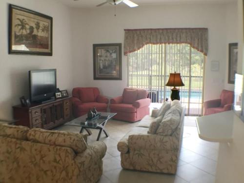 Spacious 5 Bedroom 4 Bath Pool Home in Watersong Resort, Davenport, Statele Unite ale Americii