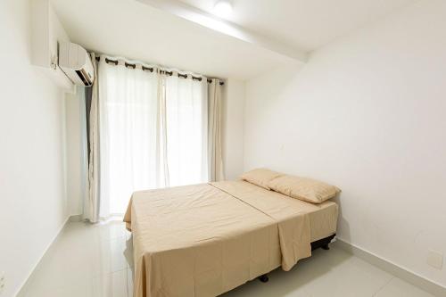 Кровать или кровати в номере In Mare Bali #358 - Ao Mar por Carpediem