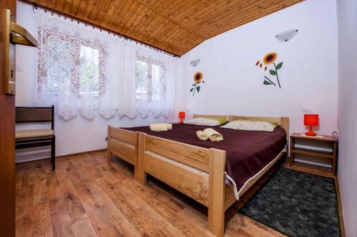 a bedroom with a large bed in a room at Apartment in Rovinj/Istrien 11562 in Štanga