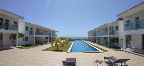 Swimmingpoolen hos eller tæt på Bangalôs Riviera do Atlantico