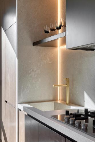 a kitchen with a sink and a stove at The One Acropolis in Athens