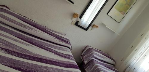 Letto o letti in una camera di Pension Salamanca